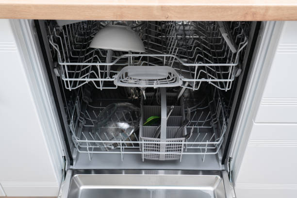 istock Dishwasher with open door as housework convenient appliance 1283884682
