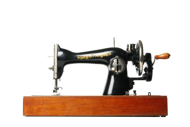 istock Old vintage sewing machine isolated on white background 1283888585