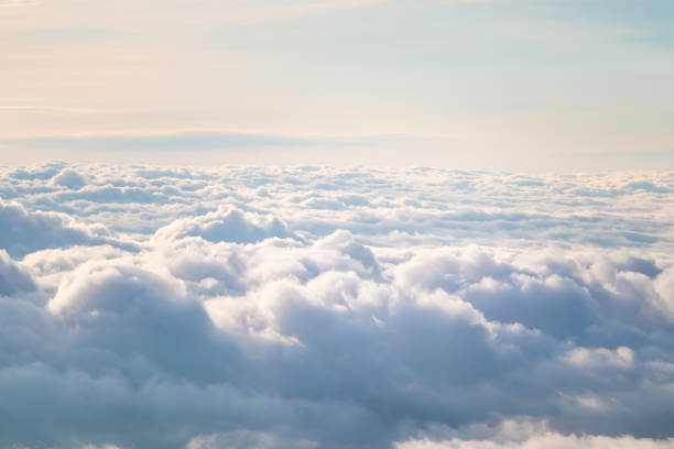 istock View at sunrise with puffy foggy. 1283888980