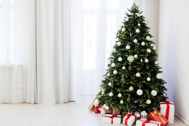 istock Window decor new year presents Christmas tree interior holiday 1283891176