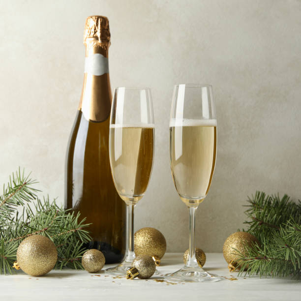 istock New year concept with champagne on white wooden table 1283893146