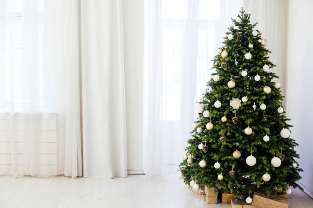 istock Window decor new year presents Christmas tree interior holiday 1283893281