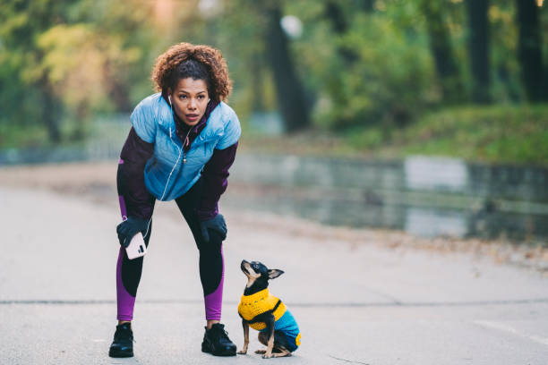 istock Sportswoman taking a breath after jogging 1283893615