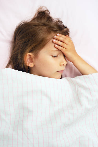 istock Sick child with fever. 1283896798