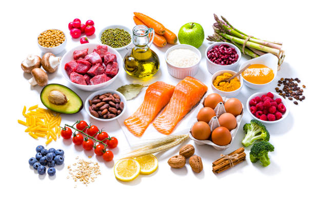 Assortment of various kinds of food types on withe background