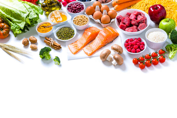 istock Assortment of various kinds of food types on withe background 1283897820