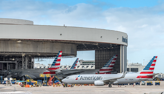 Miami, USA - November 4, 2020: American Airlines airplanes being inspected at Miami International Airport, Florida, USA.