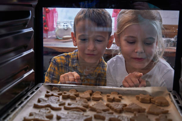 istock Preparing Gingerbread Cookies in Domestic Kitchen for December Holidays 1283901401