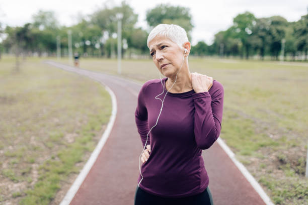 istock Mature woman having a neck ache during exercising 1283901448