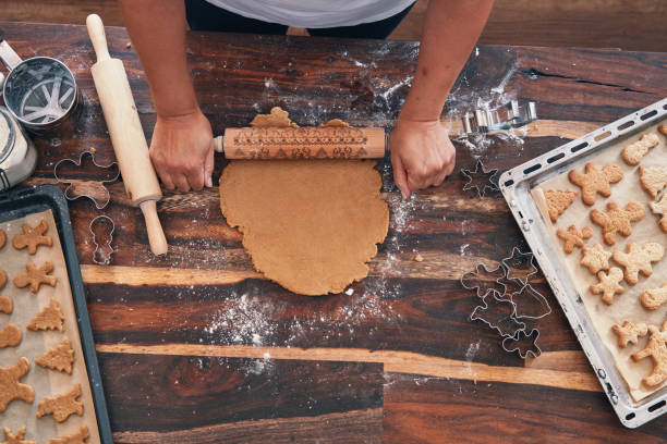 istock Preparing Gingerbread Cookies in Domestic Kitchen for December Holidays 1283901489