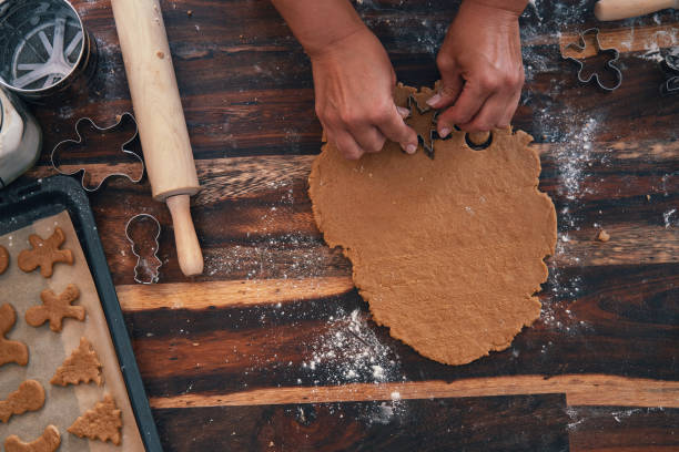 istock Preparing Gingerbread Cookies in Domestic Kitchen for December Holidays 1283901565