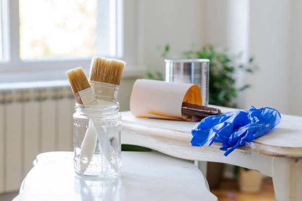 istock Painting an old wooden table at home 1283902200