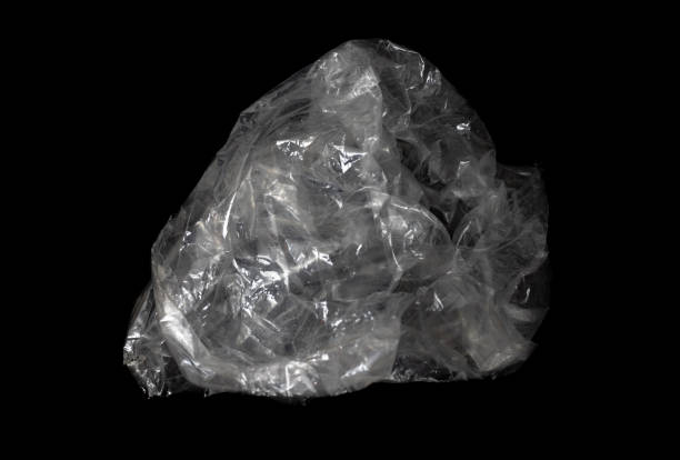 istock Warped used transparent polythene isolated on black background 1283902484