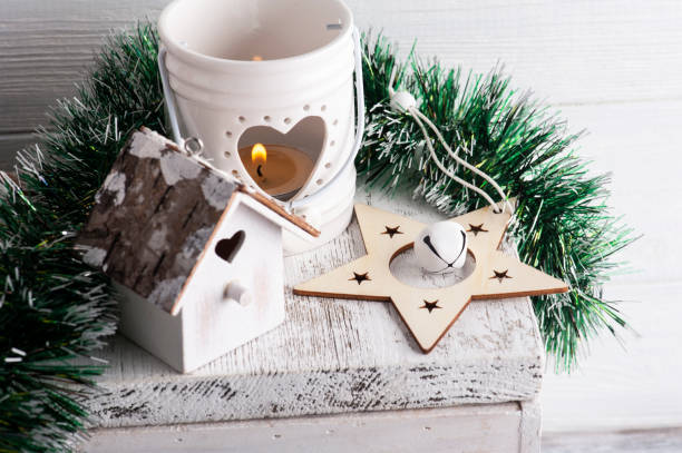 istock Christmas white star and lit candle 1283903728