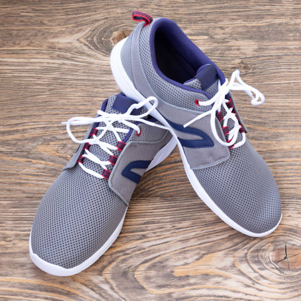 istock summer shoes on wood 1283904825