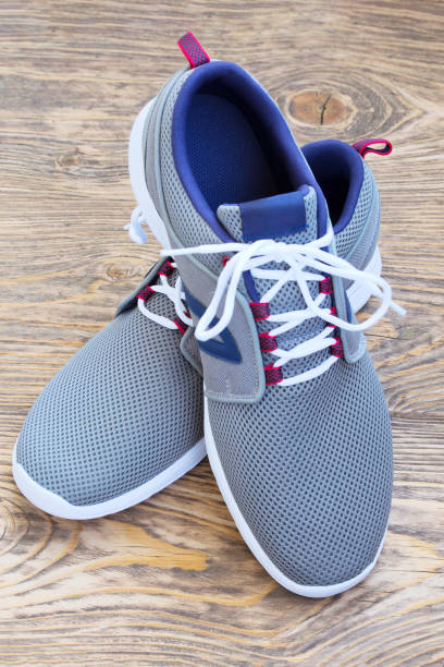 istock summer shoes on wood 1283904868