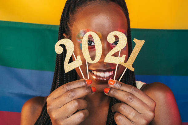 istock Woman celebrating 2021 - Happy New Year! 1283908146