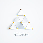 istock Holiday Card design with abstract composition composed of equilateral triangles pinned with golden pins to the white plain paper background - vector illustration with realistic shadow 3D effect and free places on your own wishes 1283908537
