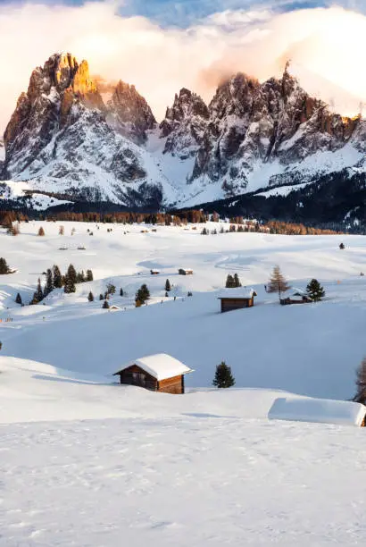 Alpe di suisi in winter at sunset covered in snow