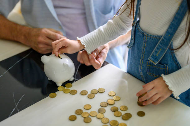 istock Teaching her the value of money 1283911475