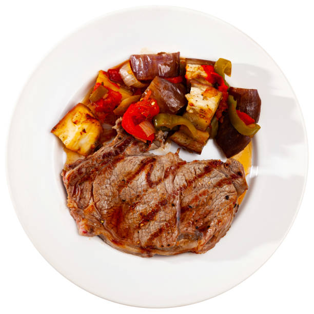 istock Beef entrecote with vegetables and stewed eggplant 1283912592