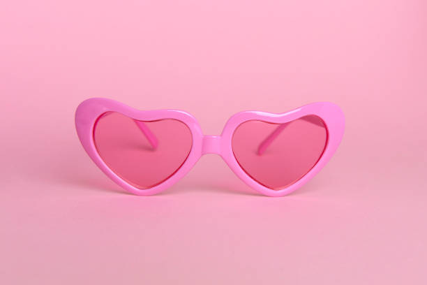 small cute plastic sunglasses on white background