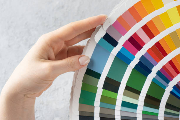 istock Choosing a color for the interior concept with a colors catalogue 1283915644