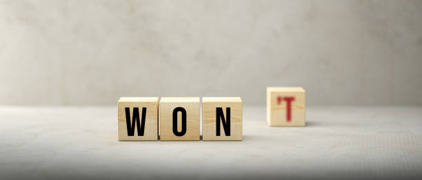 istock cubes turning message WON'T to WON - 3d illustration 1283917661