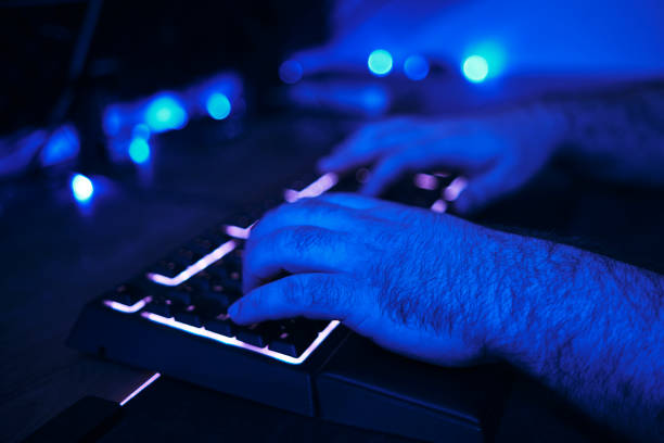 istock Keyboard of a Gamer Man Playing On The Computer. 1283919280