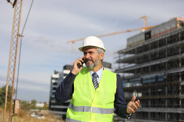 istock Senior businessman architect helmet construction site building architecture 1283919296