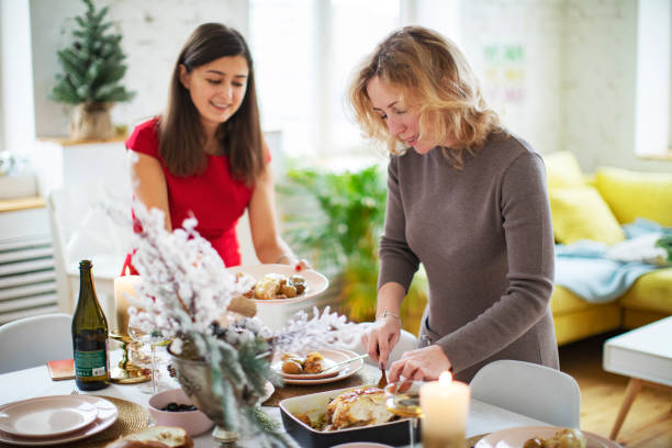 istock Friends celebrating Christmas at home 1283919502
