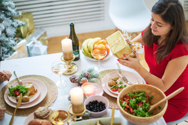istock Friends celebrating Christmas at home 1283919546