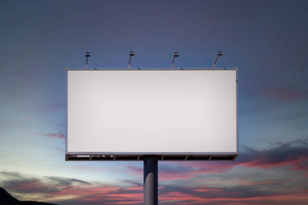 Blank billboard mock up Blank billboard mock up for advertising, at sunset billboard stock pictures, royalty-free photos & images