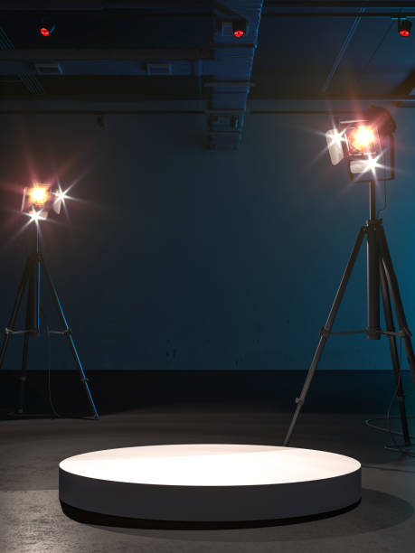 istock Blank White Round Showcase with Empty Space On Pedestal Under Bright Spotlights In Art Gallery3d rendering. 1283920964