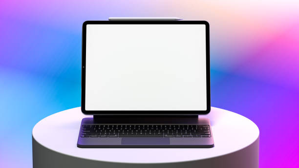 istock Black Laptop With Big Blank White Screen At Bright Gradient Multicolored Background. Copy Space. 3d rendering 1283921742