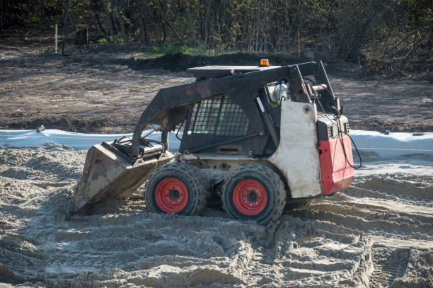 istock A small bulldozer levels the sand on the construction site 1283925541