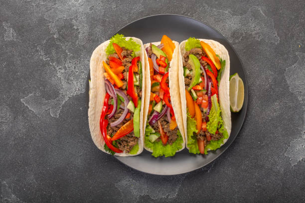 istock mexican tacos with minced meat and vegetables shot from overhead with 1283927919