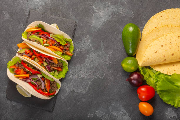istock mexican tacos with minced meat and vegetables shot from overhead with 1283927920
