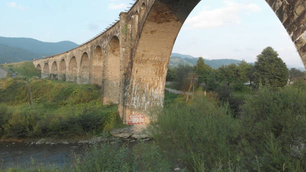 istock Old Austrian bridge at the Carpathian mountains. 1283930749