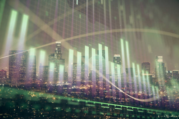istock Forex chart on cityscape with tall buildings background multi exposure. Financial research concept. 1283930832