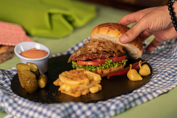 istock Beef hamburger with potatoes and hot peppers 1283931991