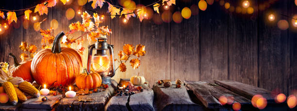 istock Thanksgiving Table - Pumpkins And Corncobs In Black Background 1283942911