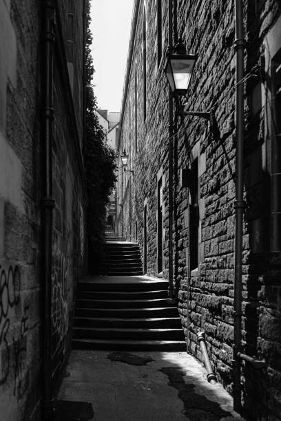 istock Narrow street with stone steps 1283943042
