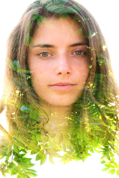 istock Young woman double exposure portrait with leaves 1283943130