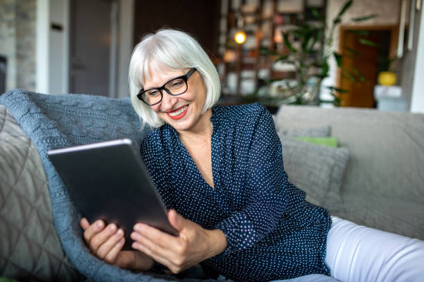 istock Mature Woman With Digital Tablet 1283948717