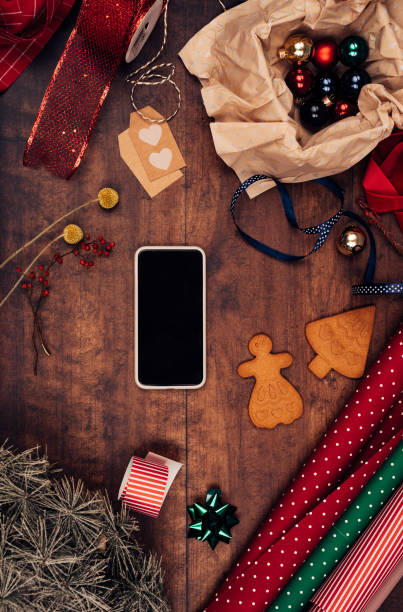istock Mobile Phone With a Blank Screen (Copy Space) as Part of a Christmas Flat Lay 1283950673