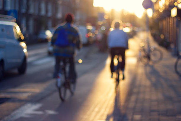 istock Blurred street view in sunset light. 1283954294