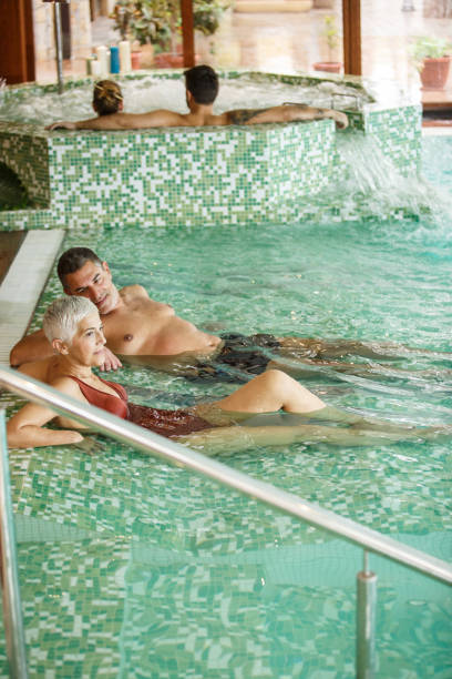 istock Enjoying the spa resort and swimming pool 1283954902