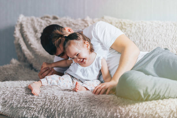 istock happy family and father's day. 1283955913