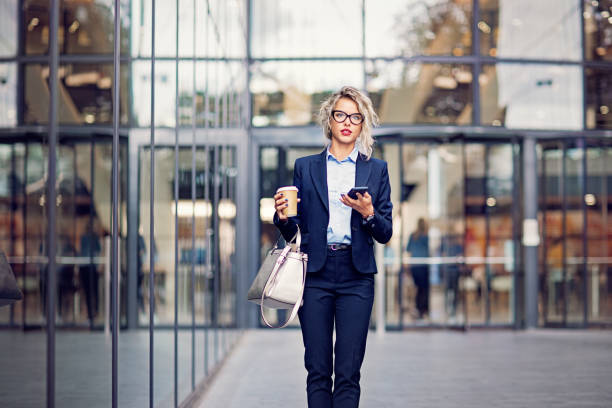 istock Young businesswoman is exiting from her office 1283958427
